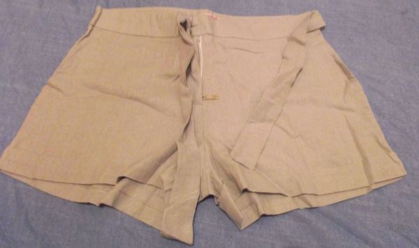 SHORTS EM MALHA SOCIAL